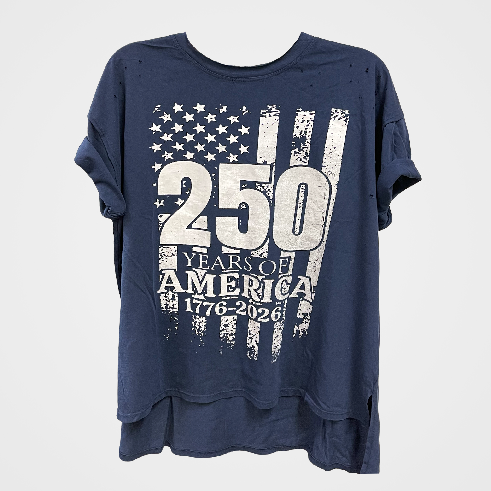 A navy blue short-sleeve t-shirt with a distressed American flag graphic and '250 YEARS OF AMERICA 1776-2026' printed on the front, displayed against a light gray background.