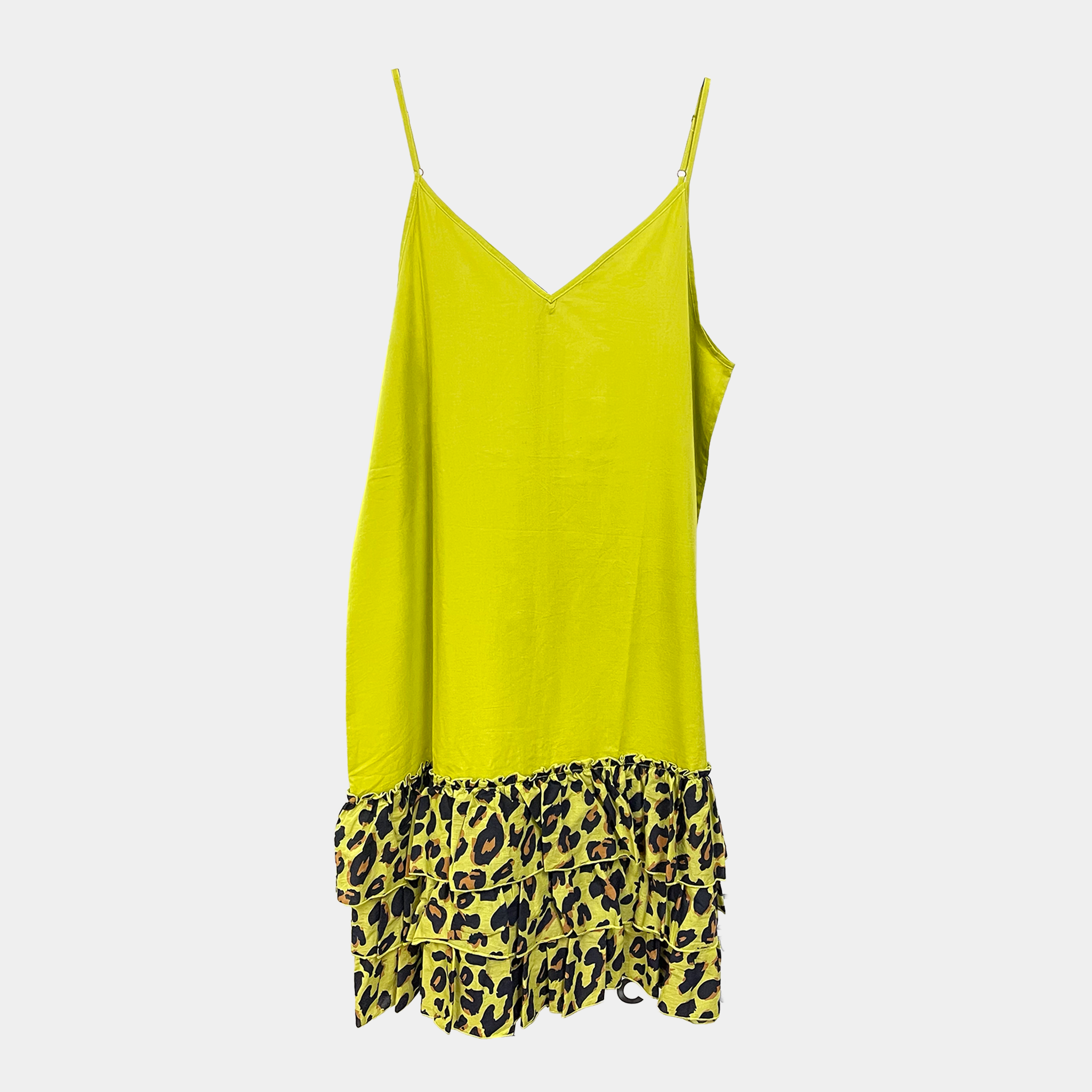 Yellow slip dress with leopard print hem on a white background teresa giamos