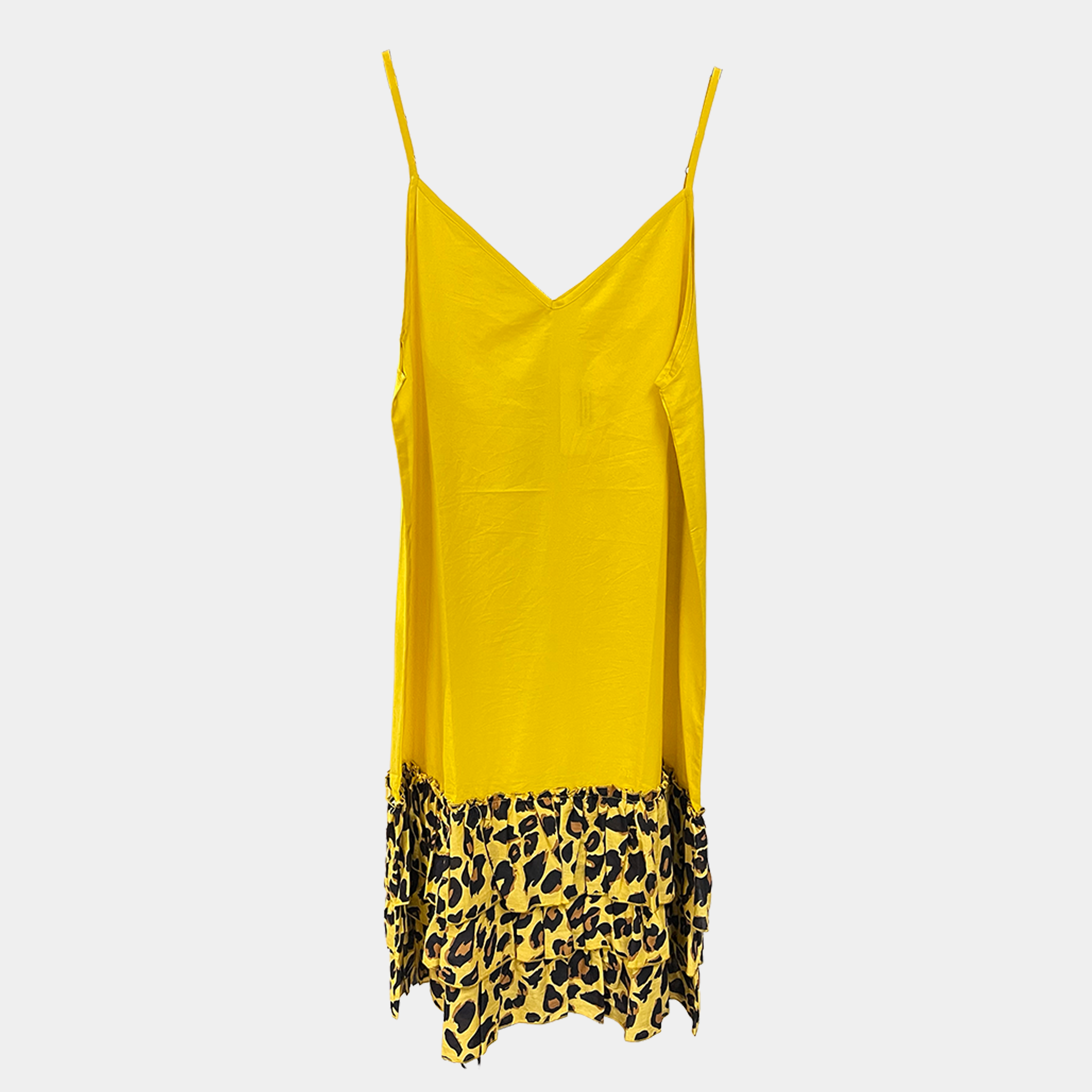 Yellow slip dress with leopard print hem on a white background. Teresa Giamos