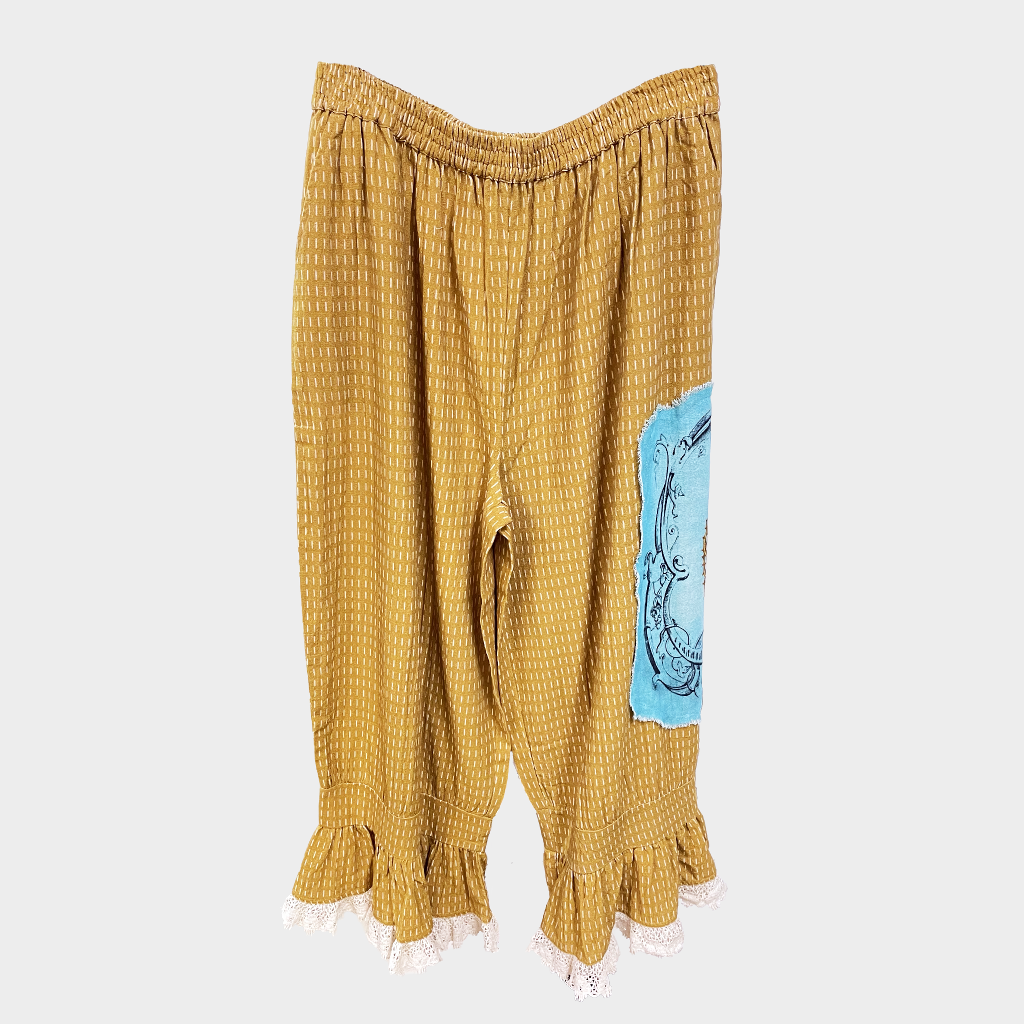 Ruffle Pants with Sacred Heart Patch | $44 Each