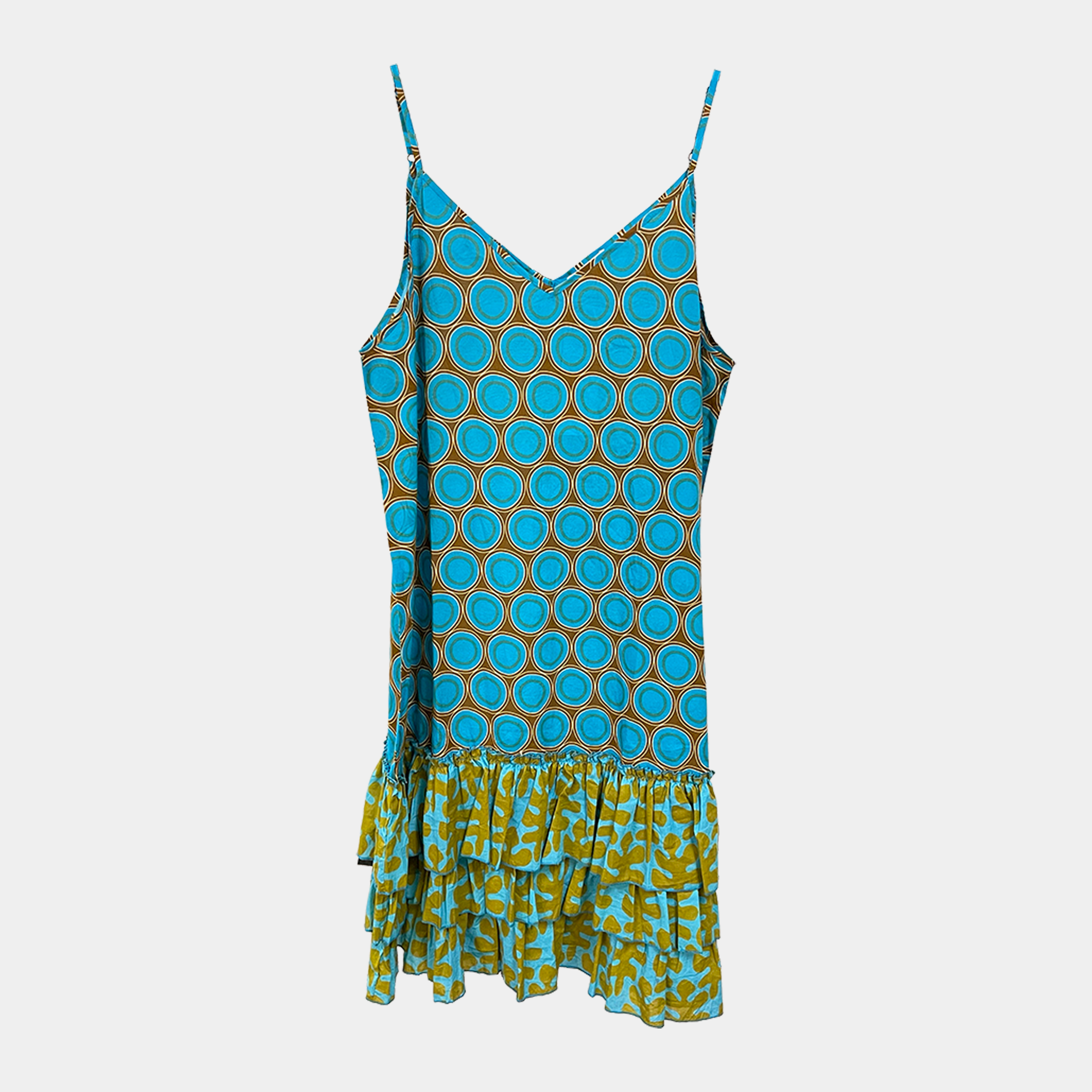 Blue and green patterned dress on a white background